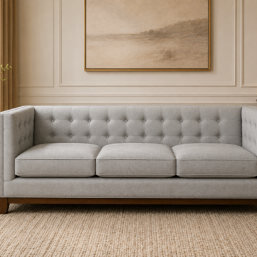 Cambridge Sofa Set handcrafted with a premium solid teak wood frame, soft dove grey fabric upholstery, subtle button-tufted detailing, exposed wooden base, and a clean contemporary design.Cambridge Sofa Set handcrafted with a premium solid teak wood frame, soft dove grey fabric upholstery, subtle button-tufted detailing, exposed wooden base, and a clean contemporary design.
