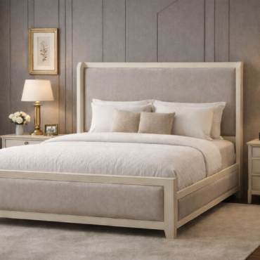 Ashford Upholstered Bed handcrafted from solid teak wood featuring an upholstered headboard and footboard in a soft neutral fabric with matching nightstands in a contemporary bedroom setting.
